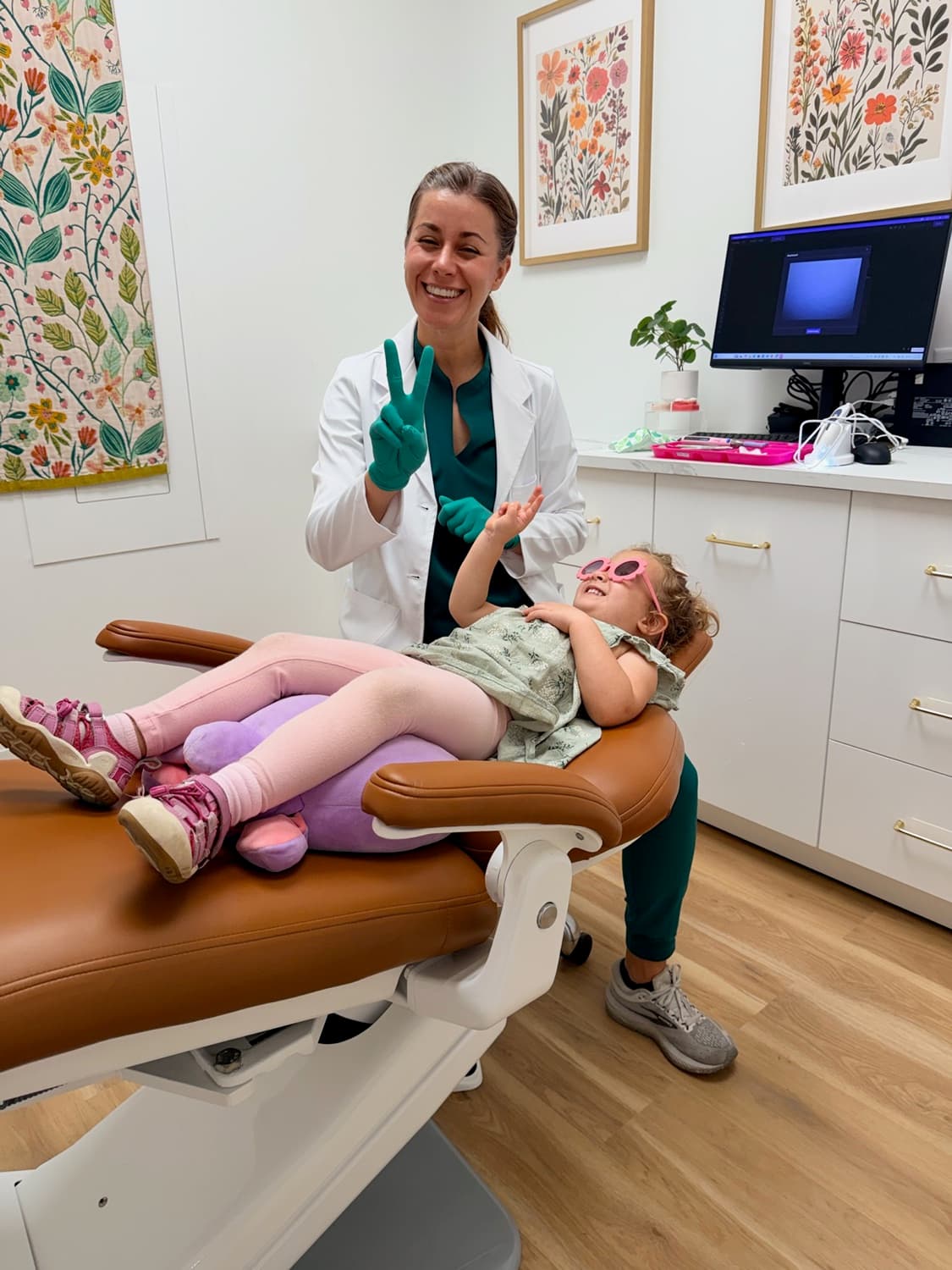 Dr. Kacie Culotta caring for a young patient